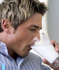 man drinking milk